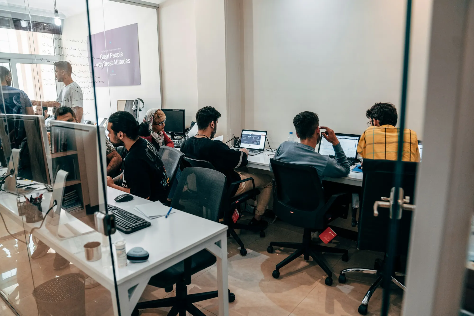 A product team at work in an open studio space